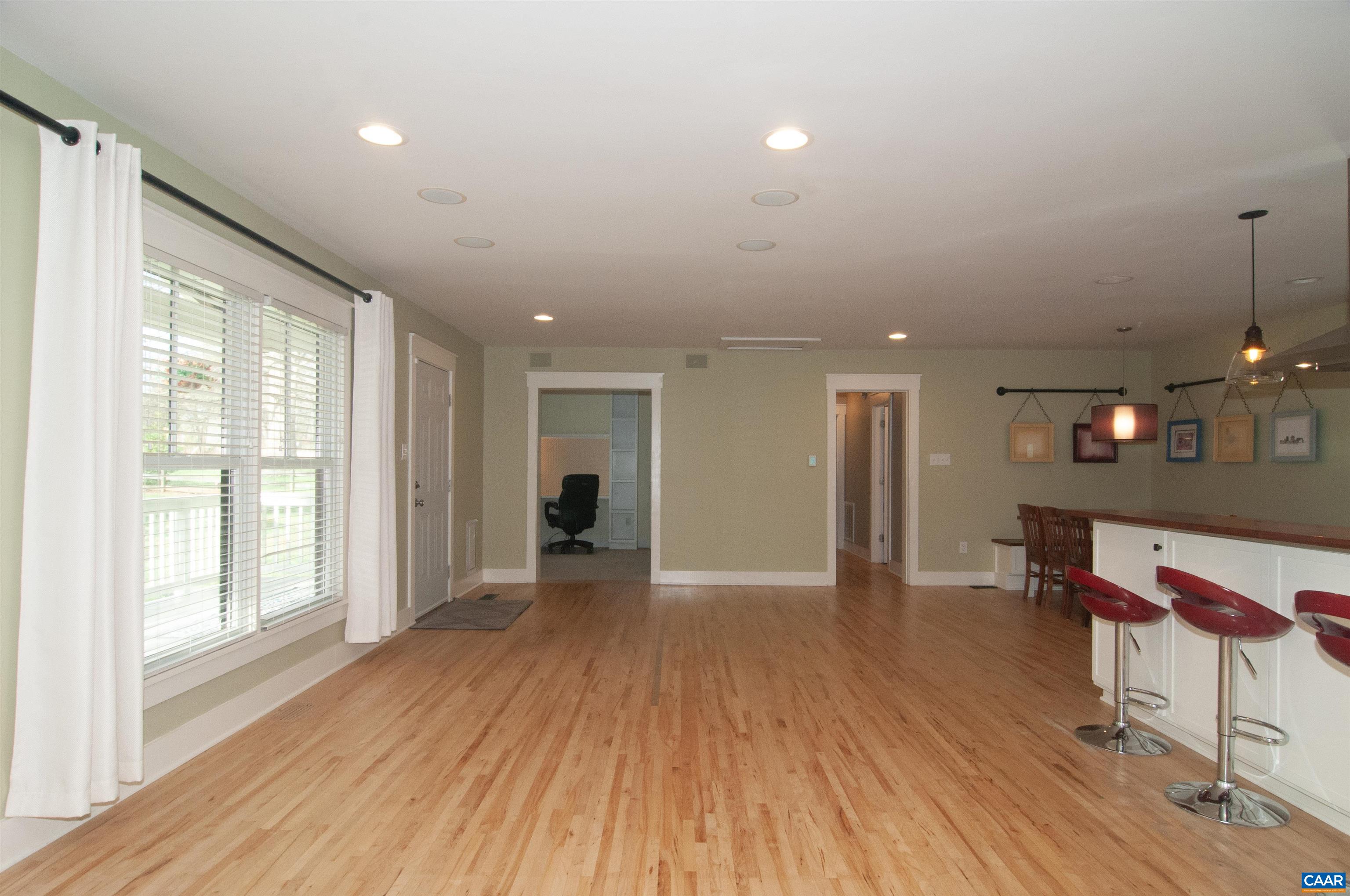 4600 Advance Mills Road Earlysville, VA 22936 - Photo 16 of 61 a view of livingroom with furniture wooden floor and windows