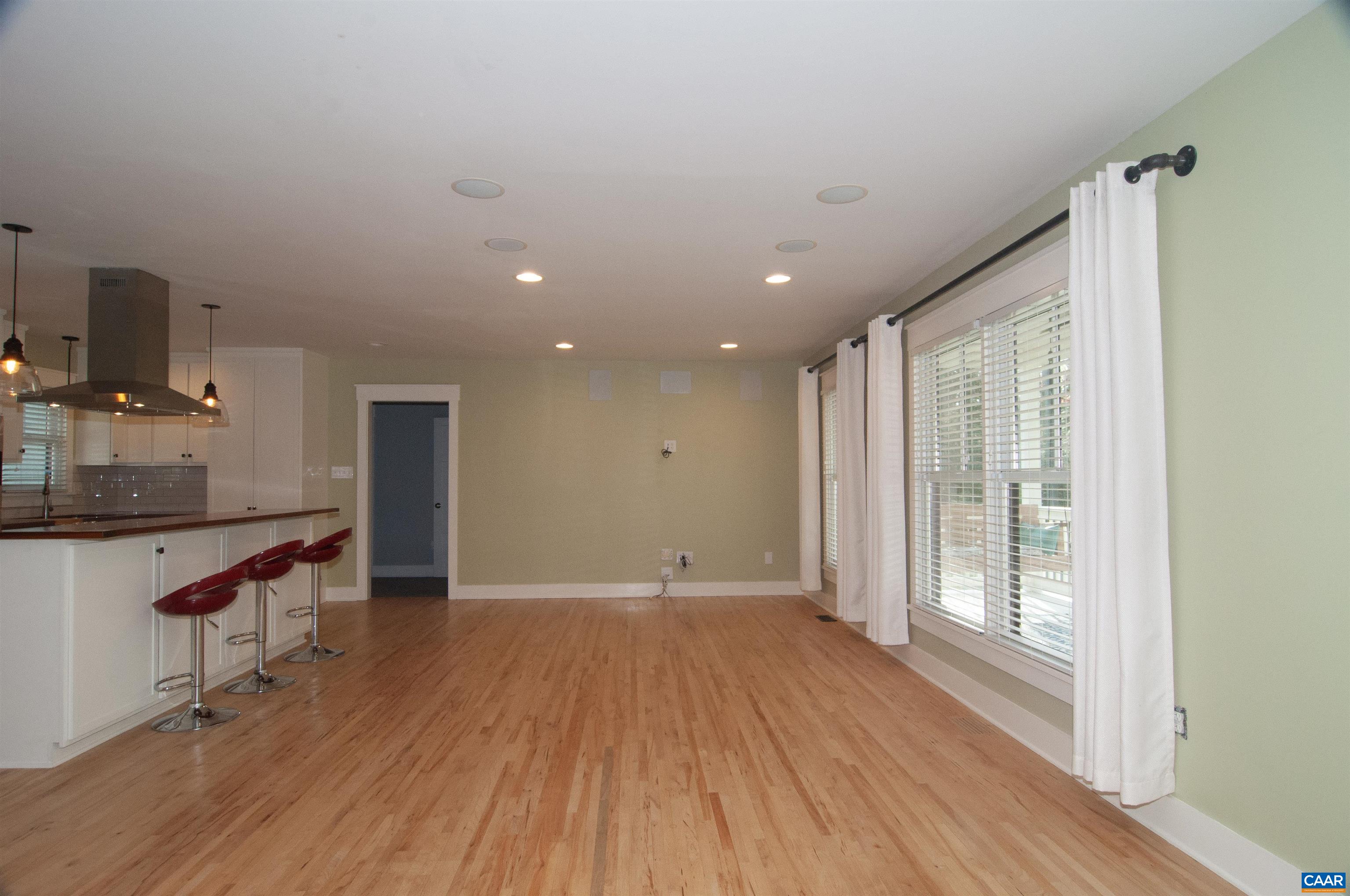 4600 Advance Mills Road Earlysville, VA 22936 - Photo 17 of 61 a view of empty room with wooden floor and fan