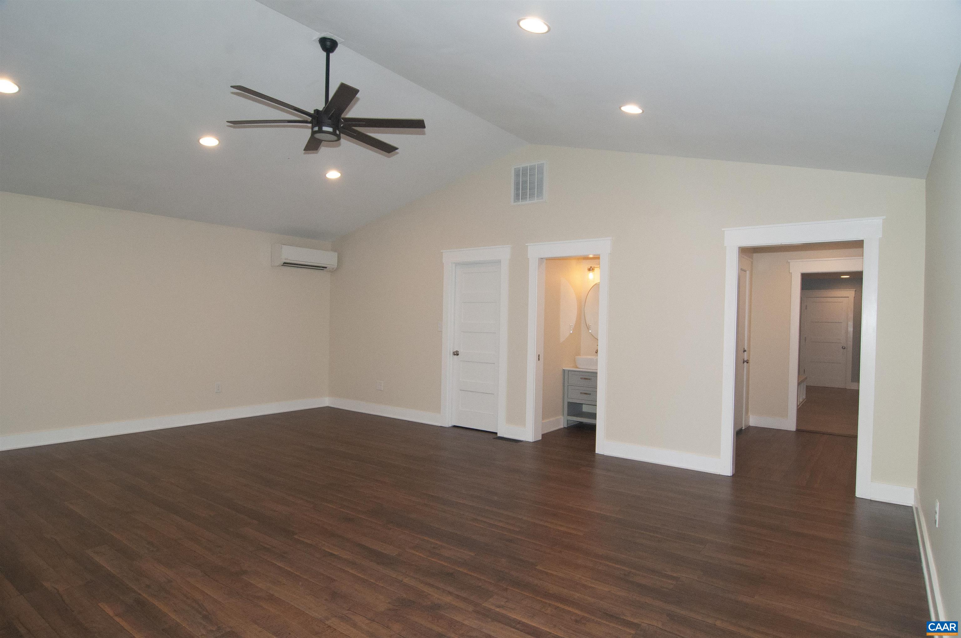 4600 Advance Mills Road Earlysville, VA 22936 - Photo 22 of 61 a view of an empty room with wooden floor