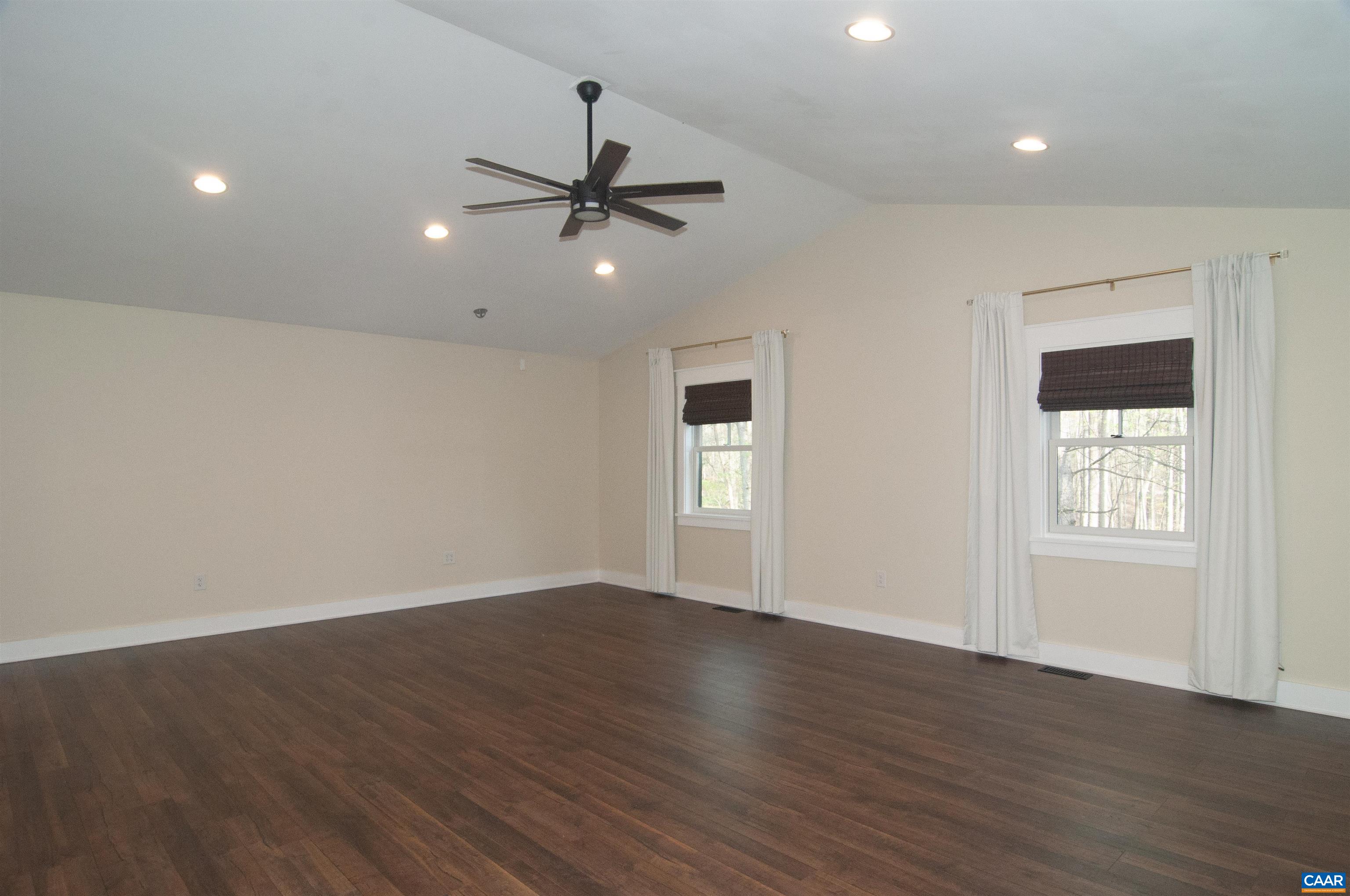 4600 Advance Mills Road Earlysville, VA 22936 - Photo 23 of 61 a view of an empty room with wooden floor and a window