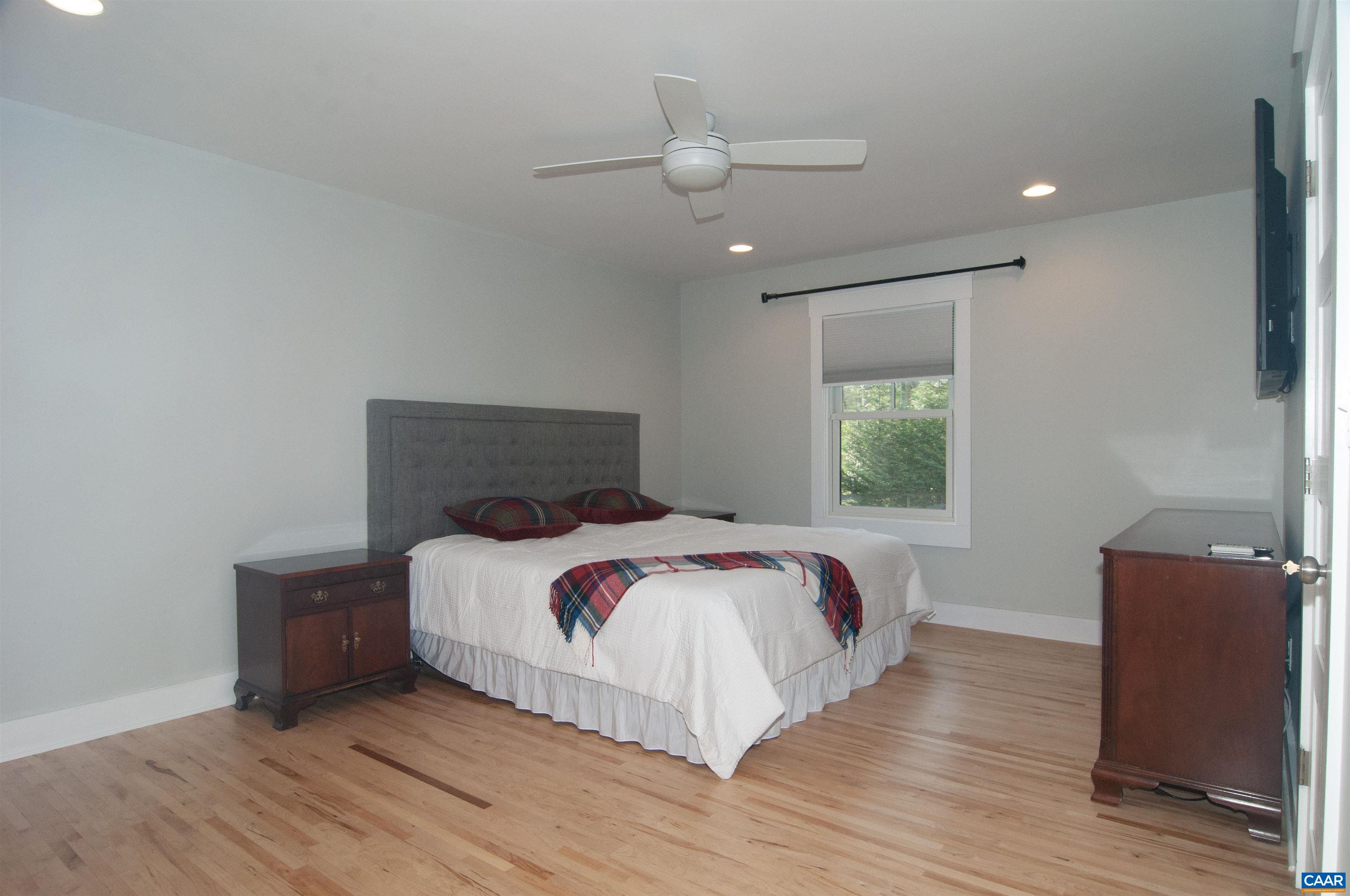 4600 Advance Mills Road Earlysville, VA 22936 - Photo 26 of 61 a bedroom with a bed and a window