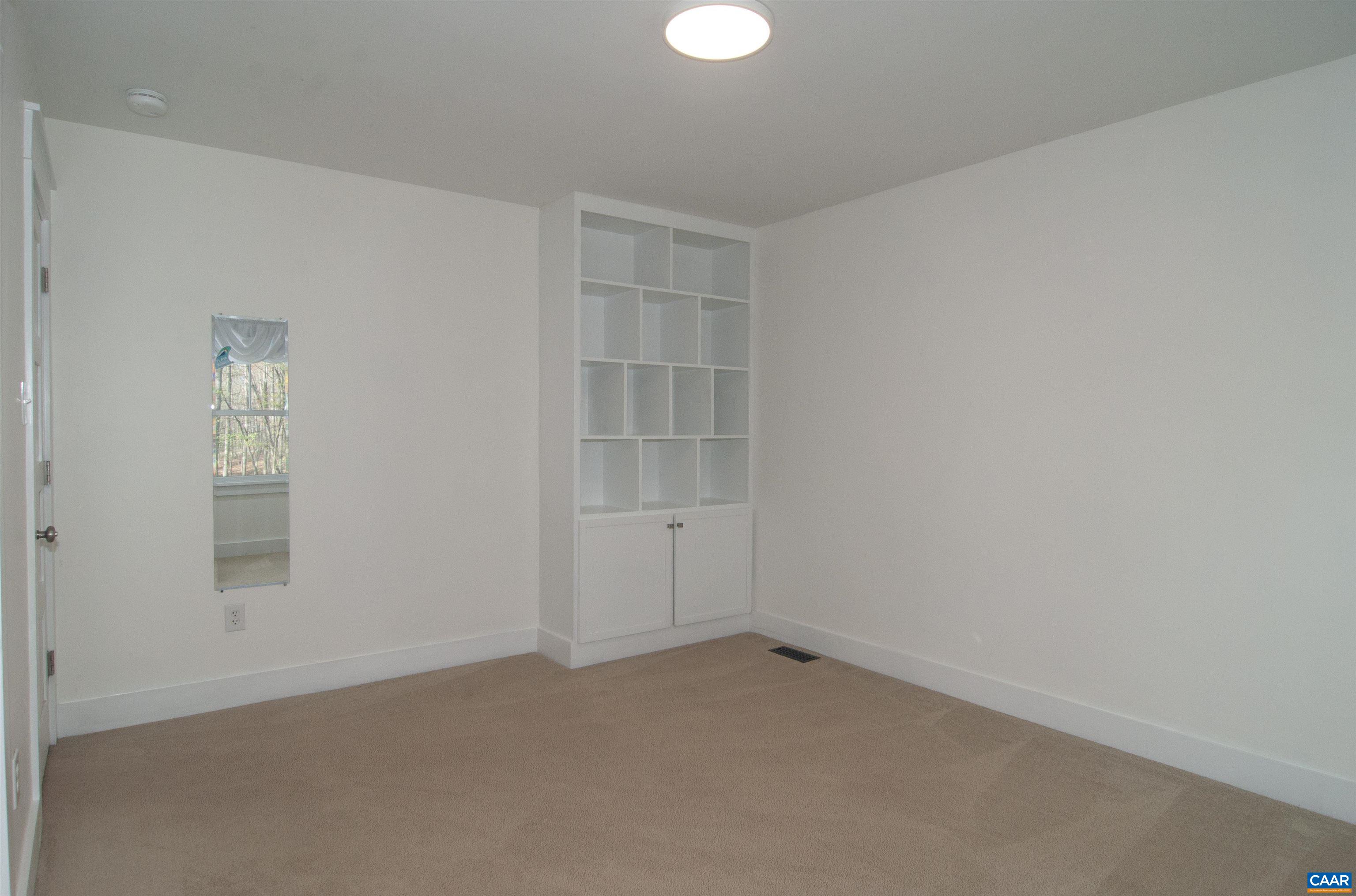 4600 Advance Mills Road Earlysville, VA 22936 - Photo 38 of 61 an empty room with a empty space and windows