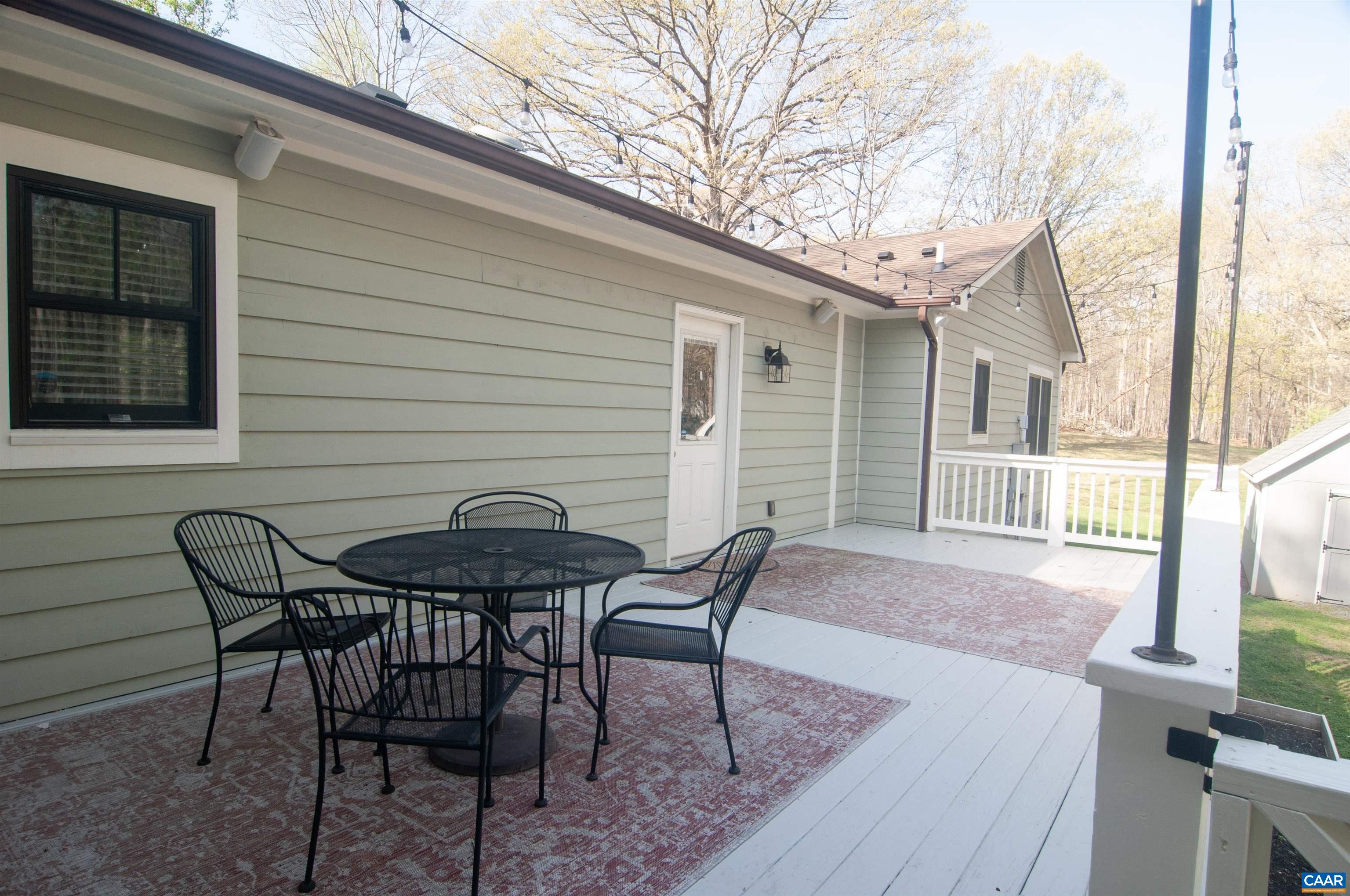 4600 Advance Mills Road Earlysville, VA 22936 - Photo 54 of 61 a view of a house with patio and wooden floor