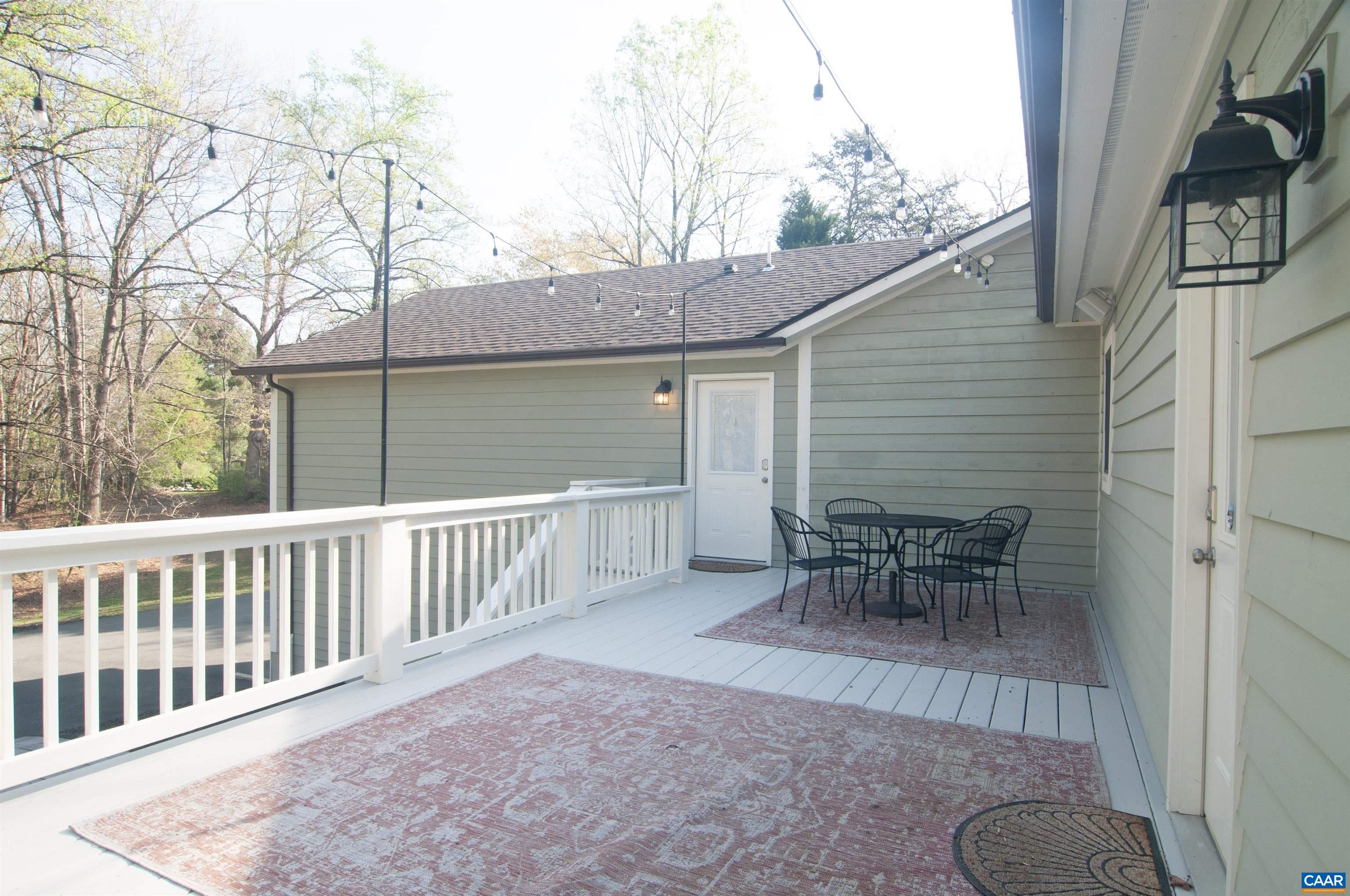 4600 Advance Mills Road Earlysville, VA 22936 - Photo 55 of 61 a view of a chair and table in backyard of the house