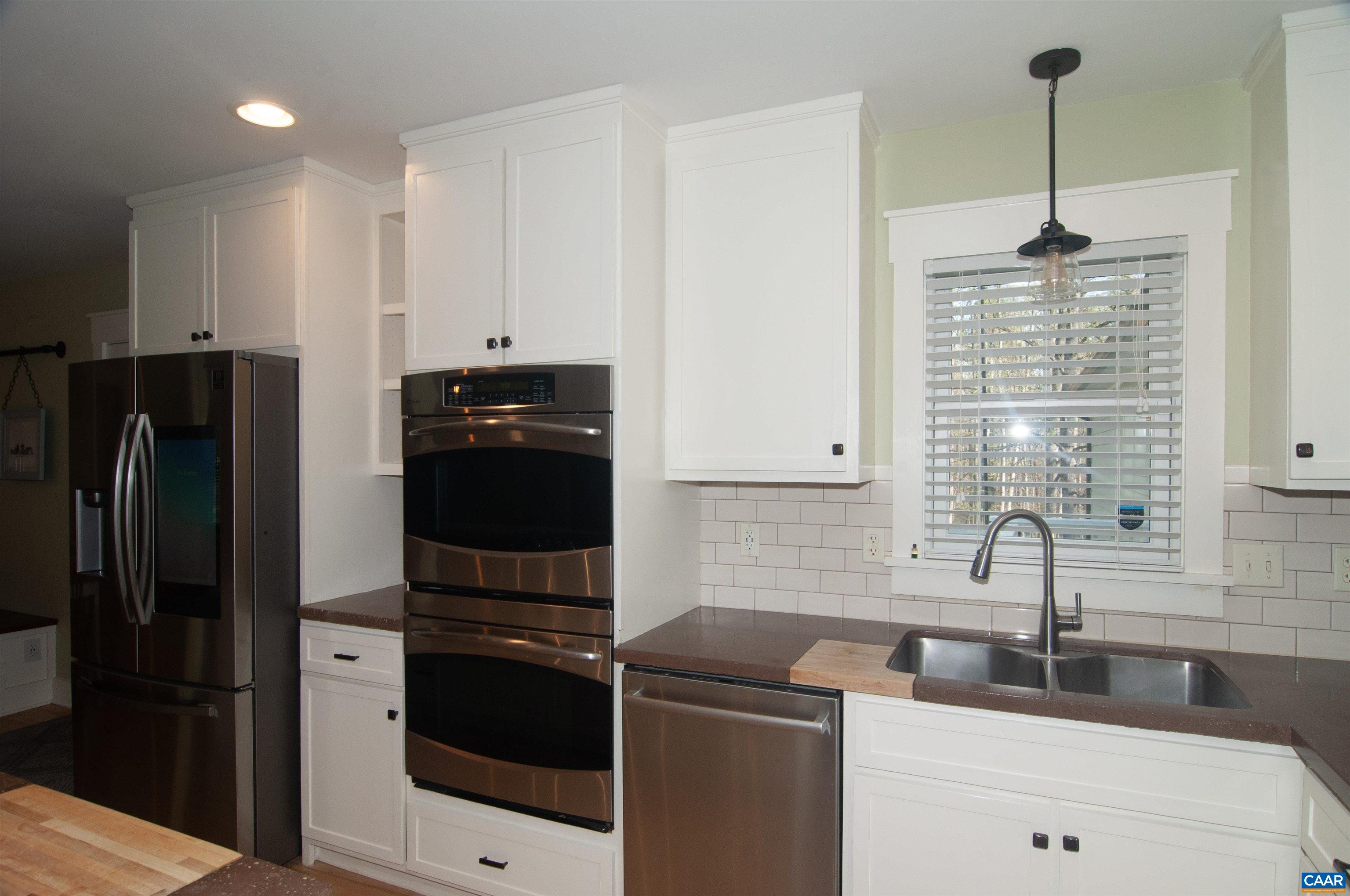 4600 Advance Mills Road Earlysville, VA 22936 - Photo 8 of 61 a kitchen with a refrigerator and a sink