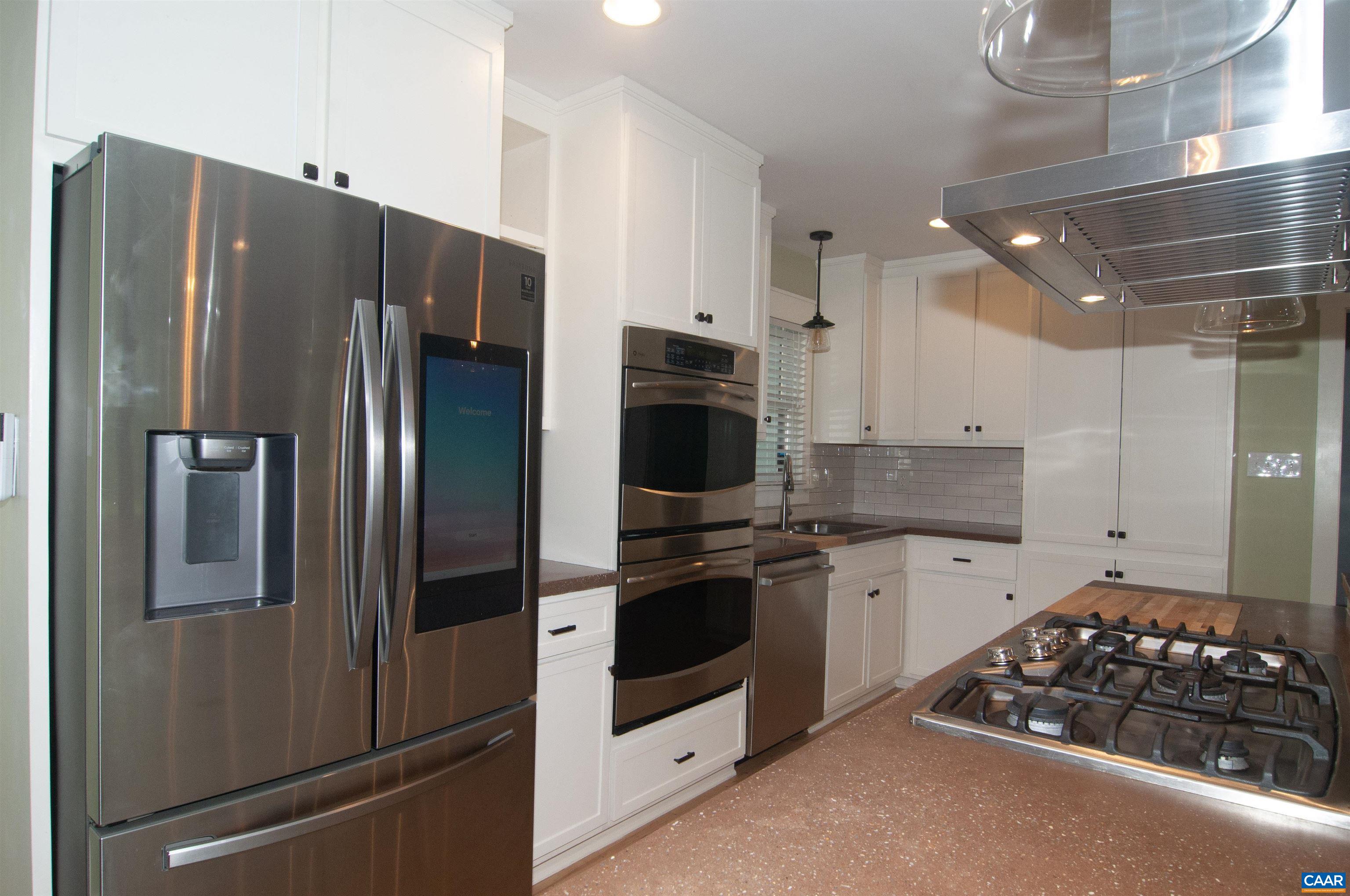4600 Advance Mills Road Earlysville, VA 22936 - Photo 9 of 61 a kitchen with stainless steel appliances granite countertop a refrigerator and a stove