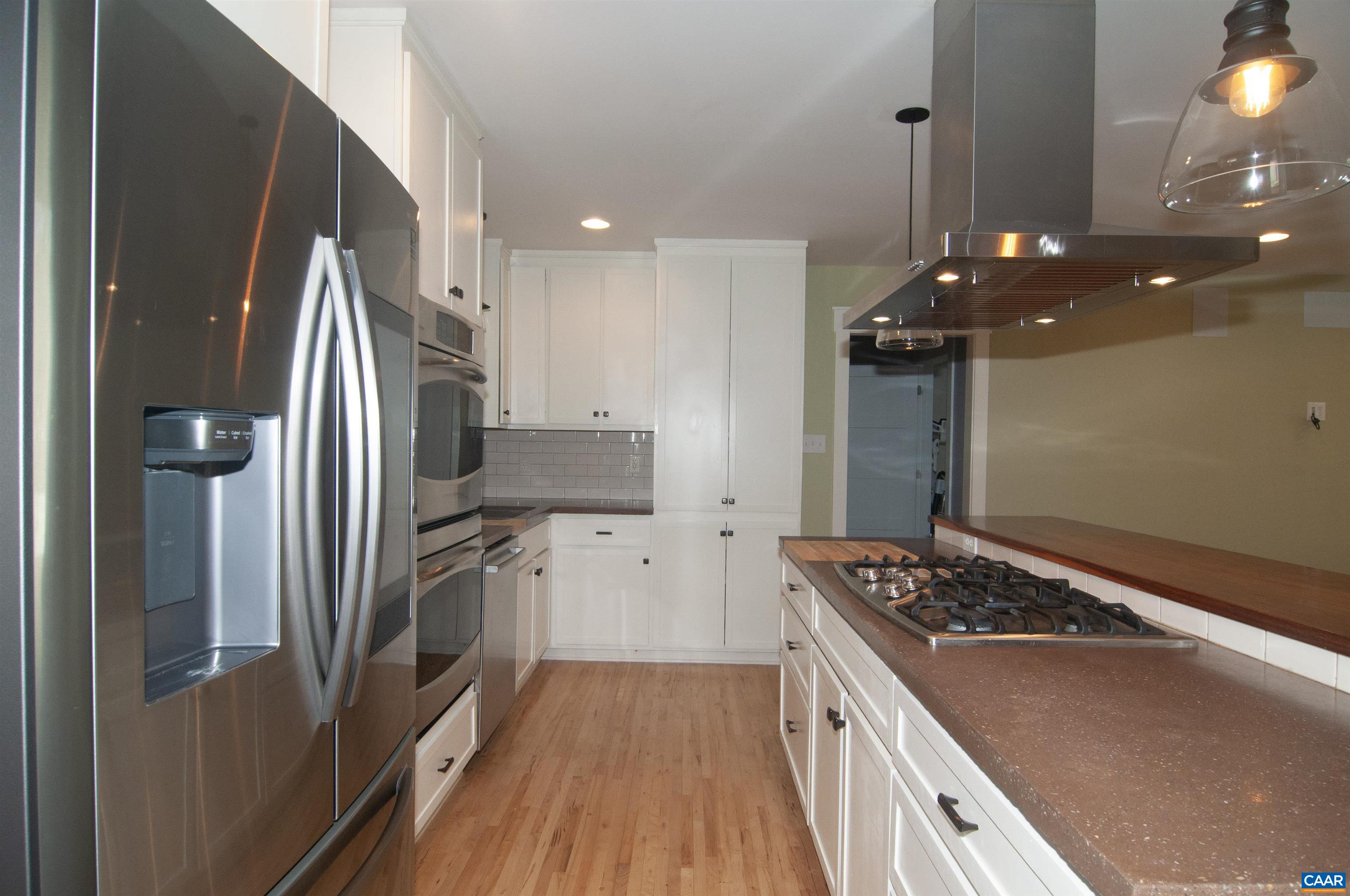 4600 Advance Mills Road Earlysville, VA 22936 - Photo 10 of 61 a kitchen with a stove and a refrigerator