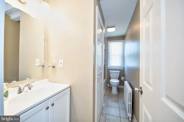 a bathroom with a sink and a toilet