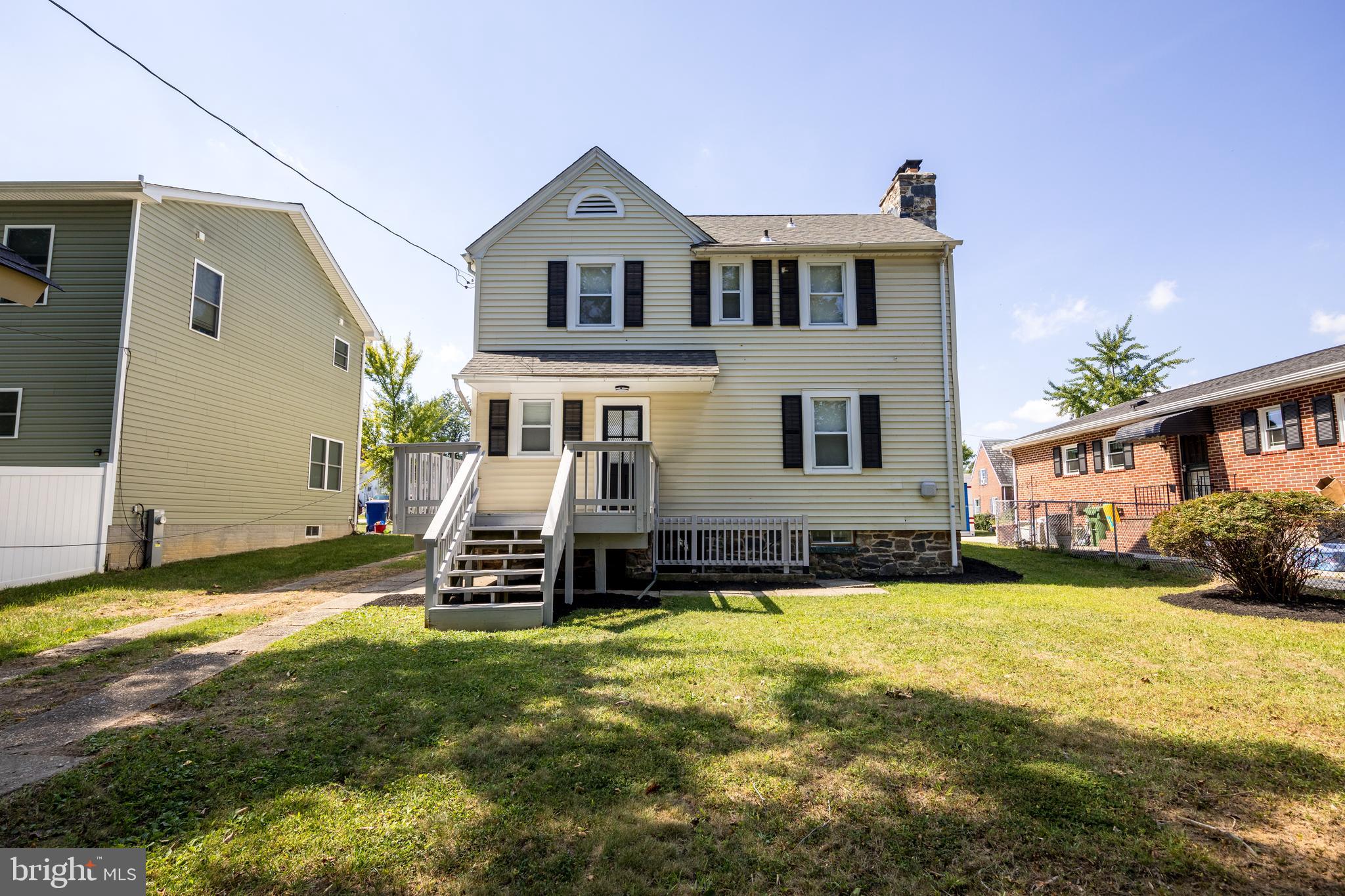 2326 Ivy Avenue Baltimore, MD 21214 - Photo 25 of 30 a front view of a house with a yard