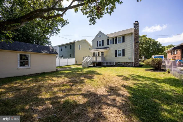 a view of a house with a big yard
