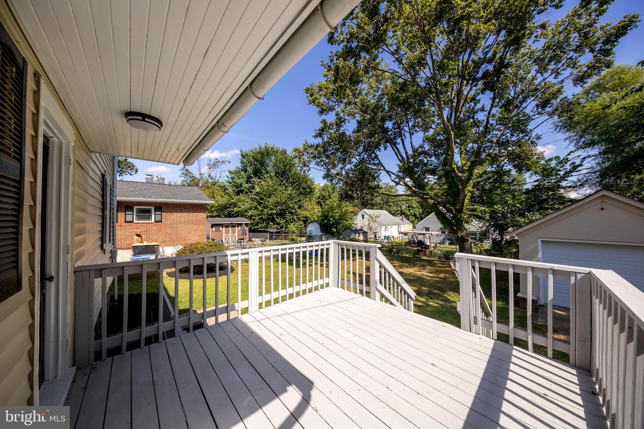 2326 Ivy Avenue Baltimore, MD 21214 - Photo 29 of 30 a view of balcony with deck and wooden floor