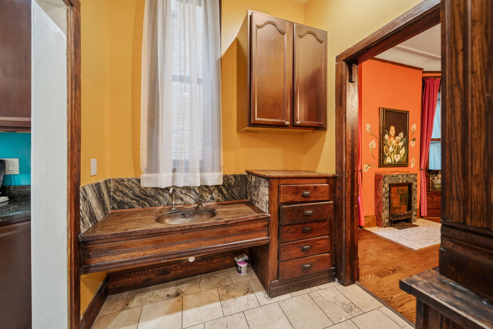 3602 South Prairie Avenue Chicago, IL 60653 - Photo 13 of 34 a reading room with wooden furniture and paintings on the wall