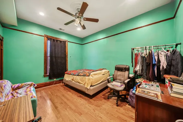 a bathroom with a sink vanity tub and shower