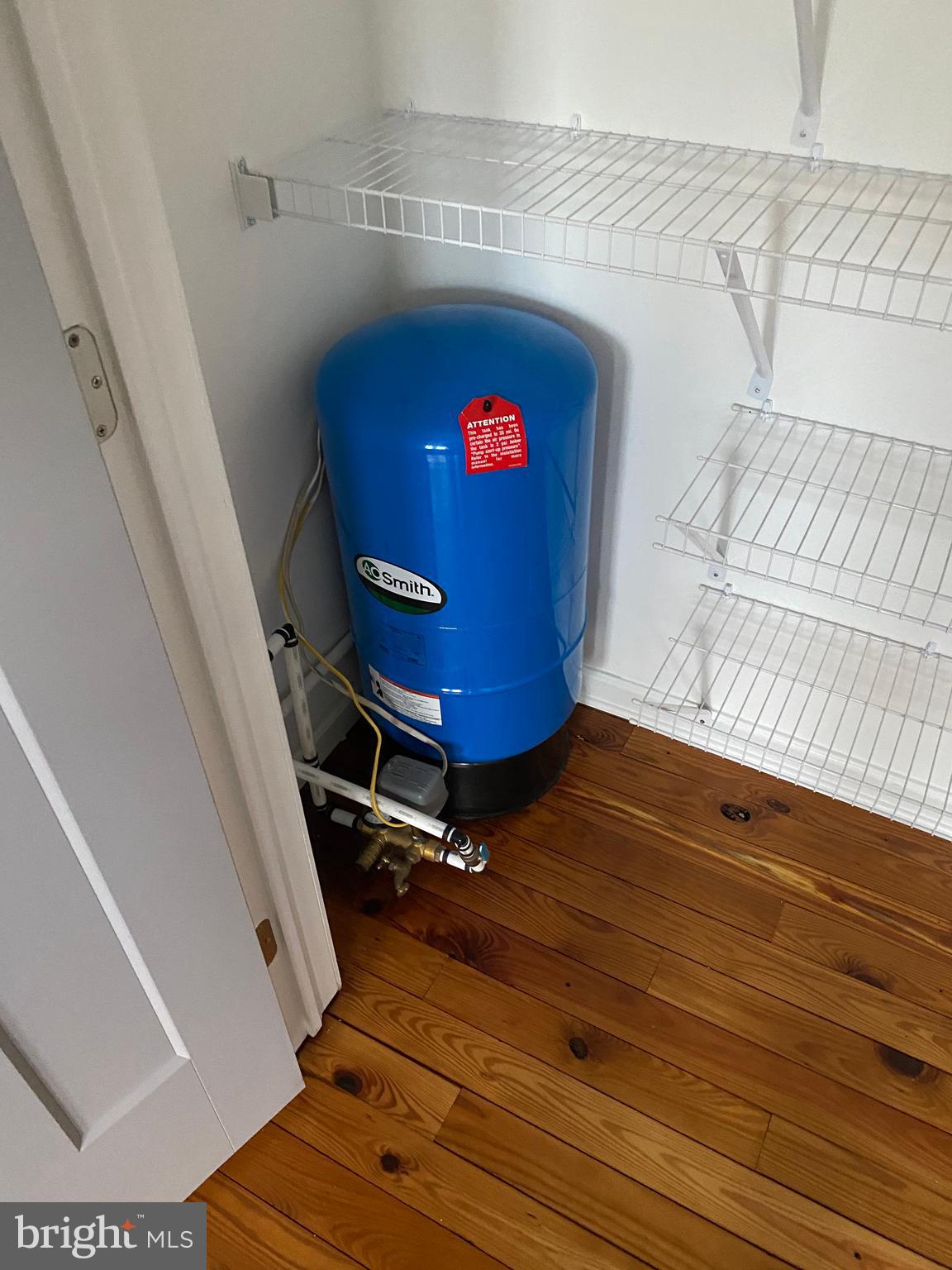 5730 Newton Road Preston, MD 21655 - Photo 56 of 74 pantry in kitchen with water pressure tank