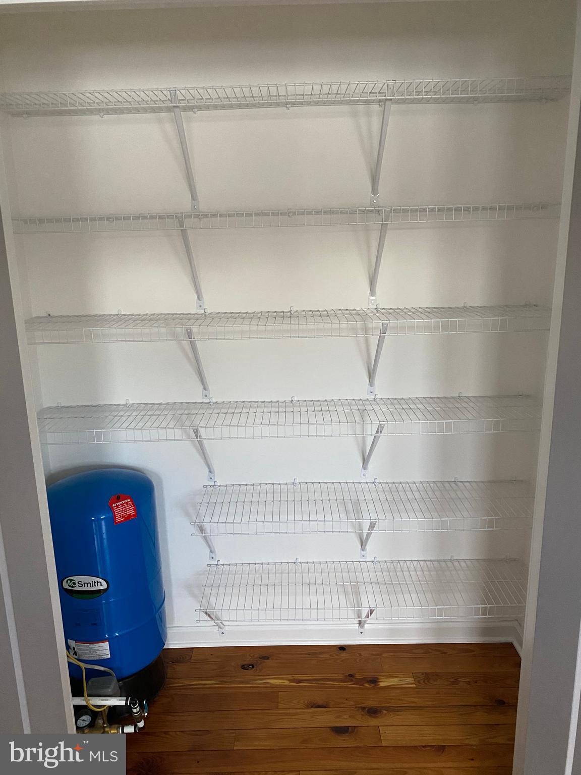 5730 Newton Road Preston, MD 21655 - Photo 57 of 74 pantry in kitchen with water pressure tank