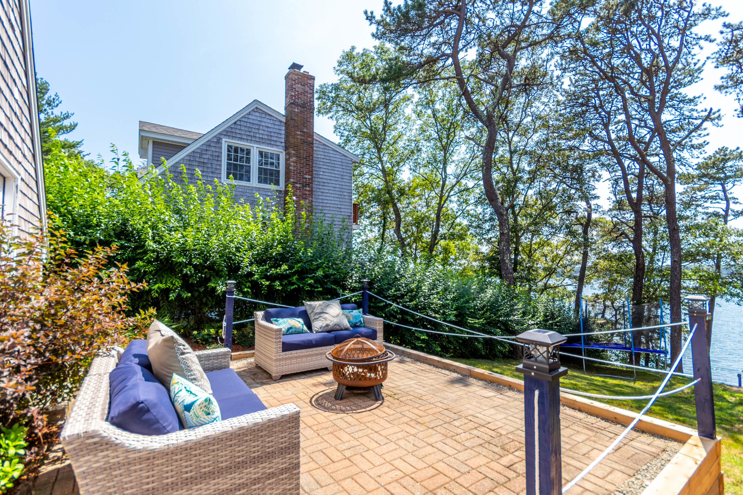 240 Wheeler Road Mashpee, MA 02649 - Photo 29 of 36 Patio overlooking the pond