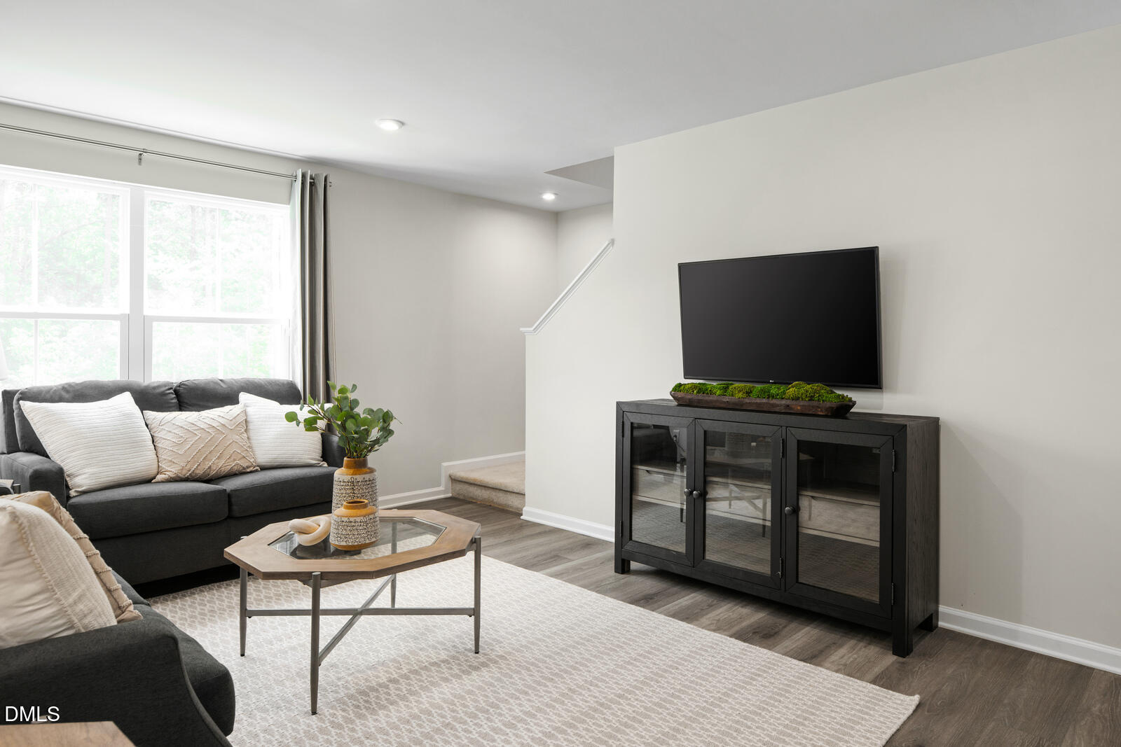 132 Cavalier Rider Run Wendell, NC 27591 - Photo 11 of 23 a living room with furniture and a flat screen tv