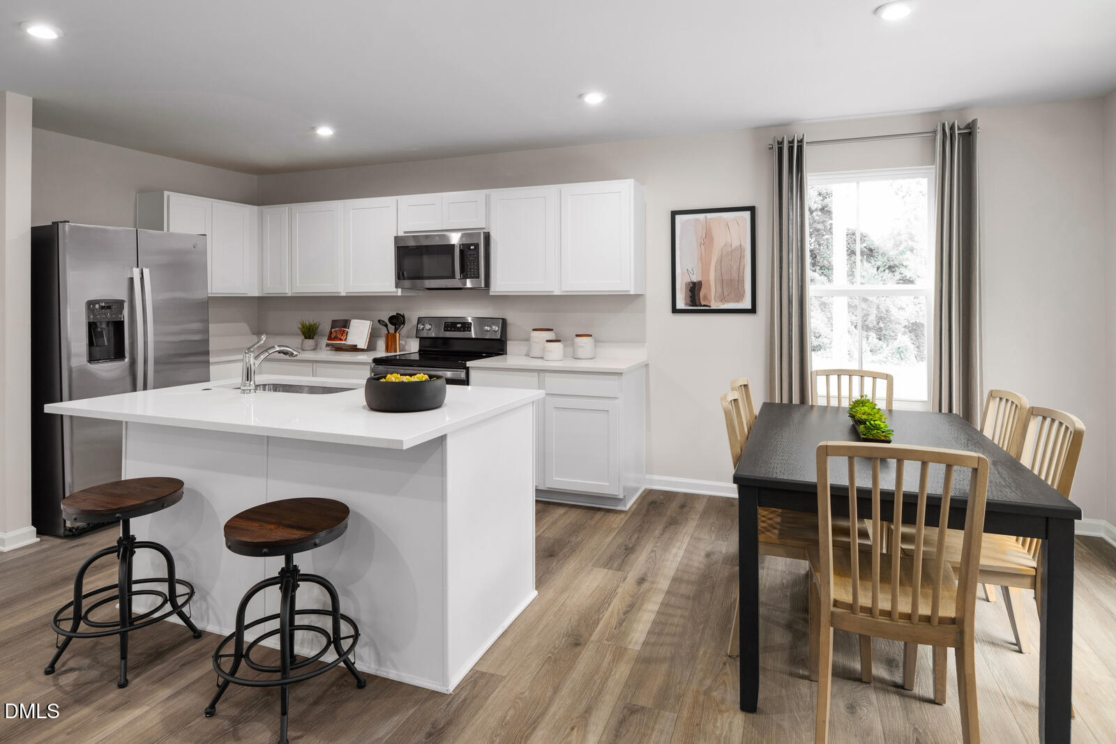 132 Cavalier Rider Run Wendell, NC 27591 - Photo 5 of 23 a kitchen with stainless steel appliances granite countertop a dining table chairs refrigerator and sink