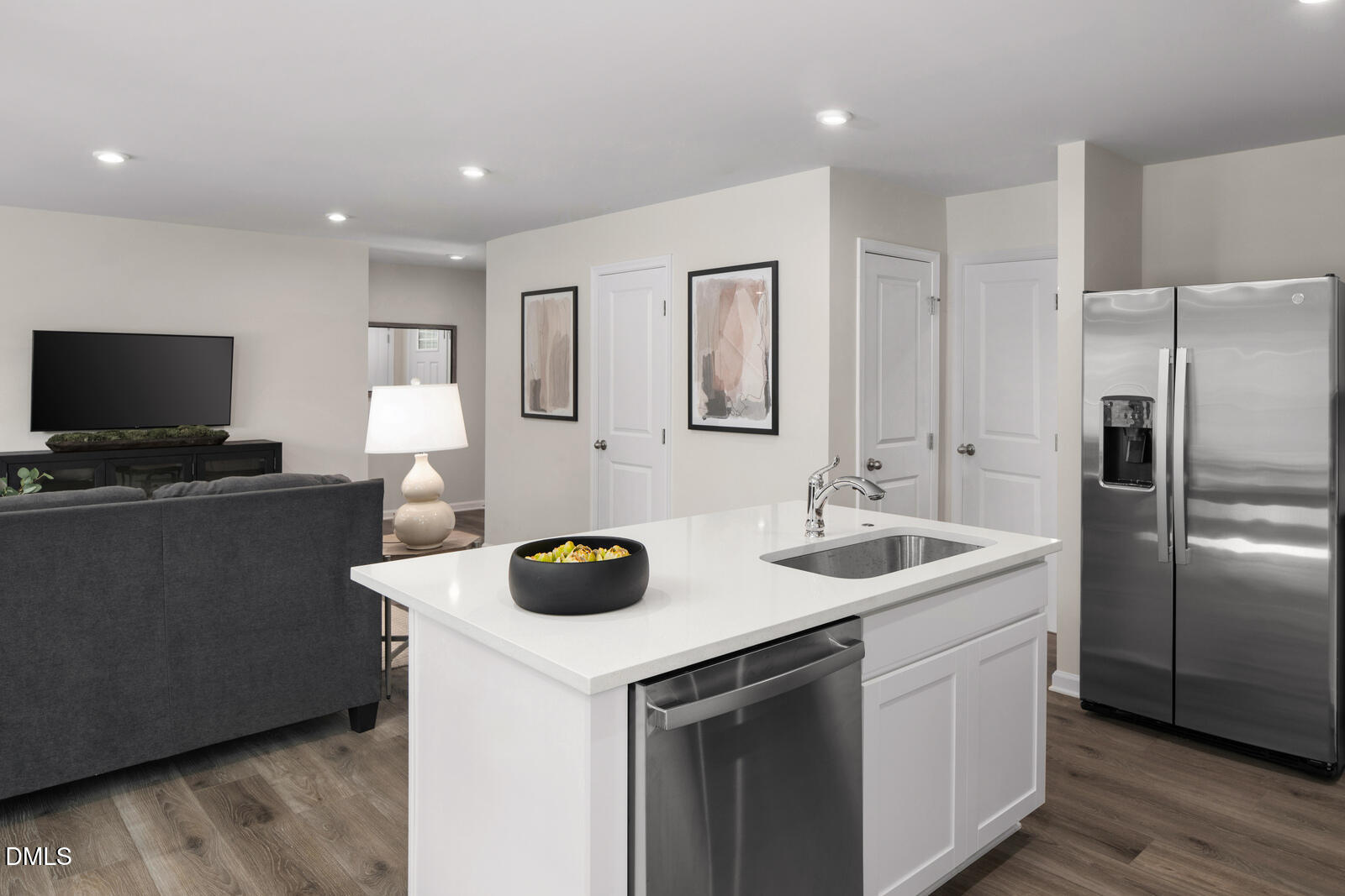 132 Cavalier Rider Run Wendell, NC 27591 - Photo 7 of 23 a kitchen with a sink a counter space and stainless steel appliances