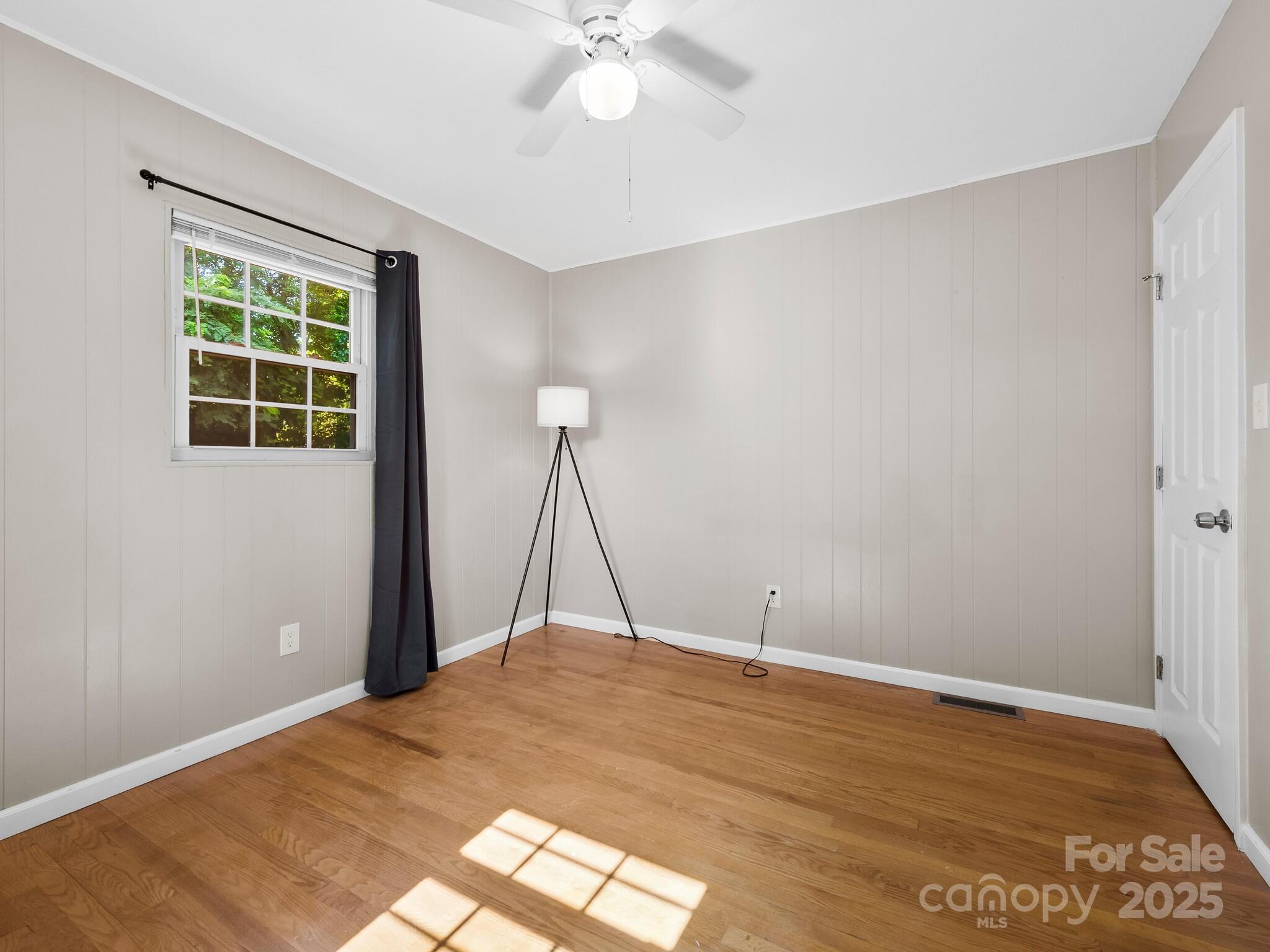 8 Vista Knoll Road Candler, NC 28715 - Photo 16 of 32 a view of an empty room with a window