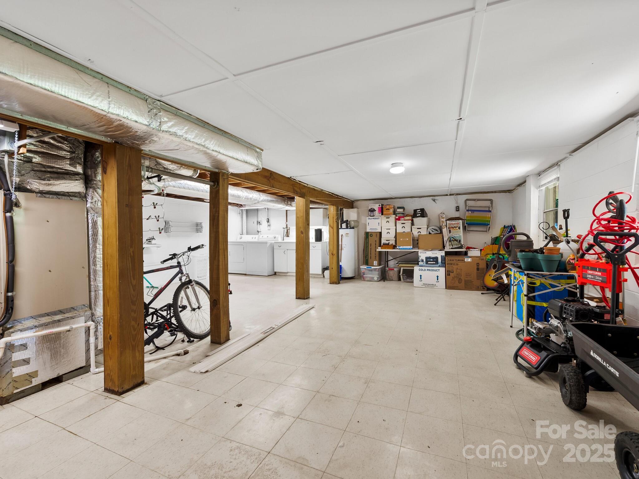 8 Vista Knoll Road Candler, NC 28715 - Photo 20 of 32 a view of a room with gym equipment