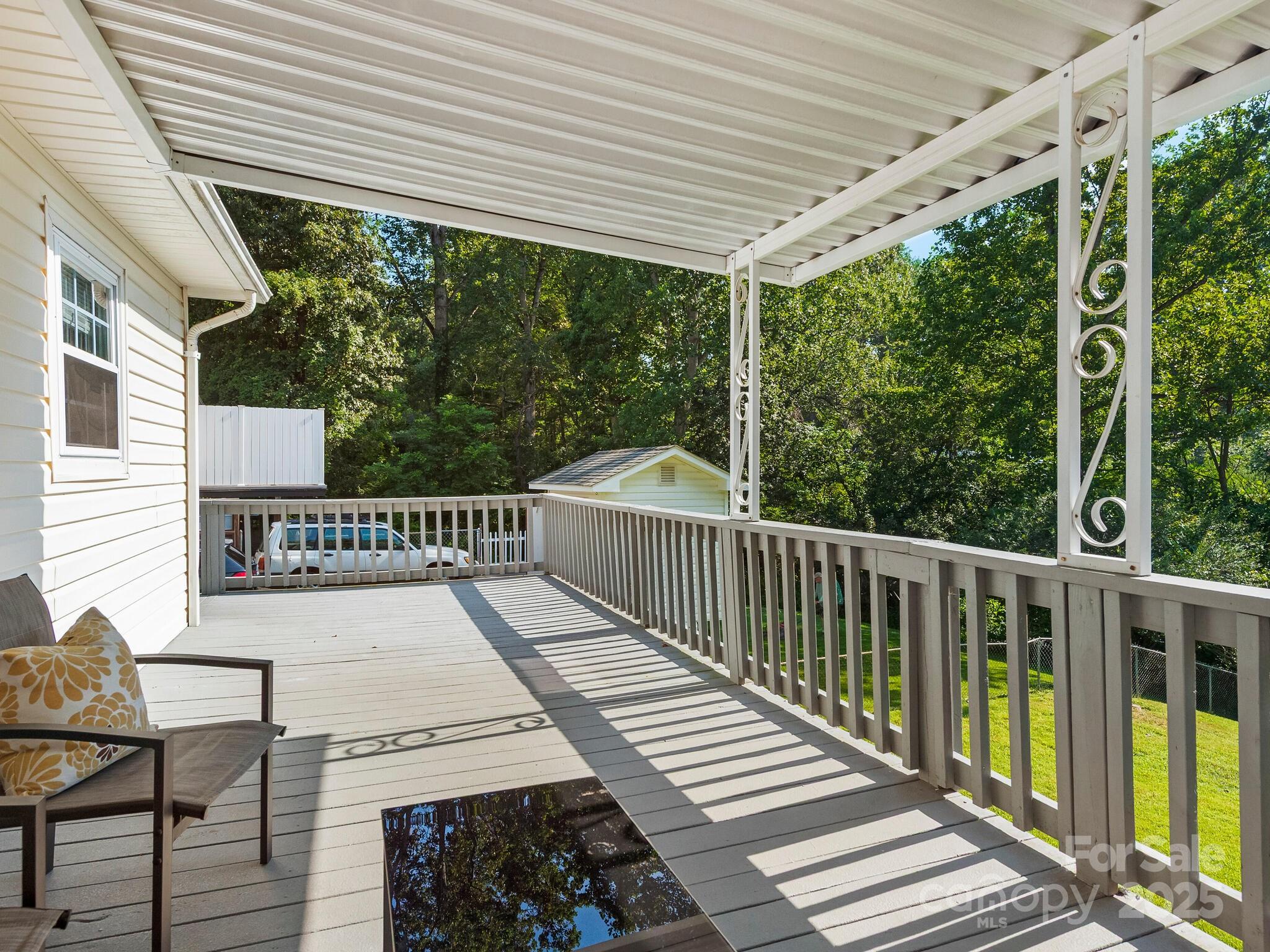 8 Vista Knoll Road Candler, NC 28715 - Photo 31 of 32 a view of a wooden deck
