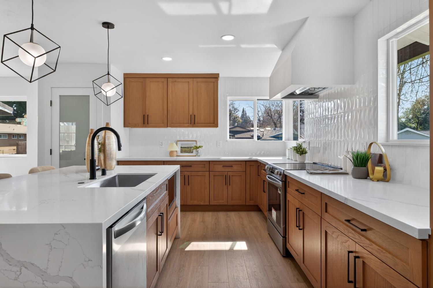 2546 El Vita Way Carmichael, CA 95608 - Photo 15 of 52 a kitchen with a sink and appliances