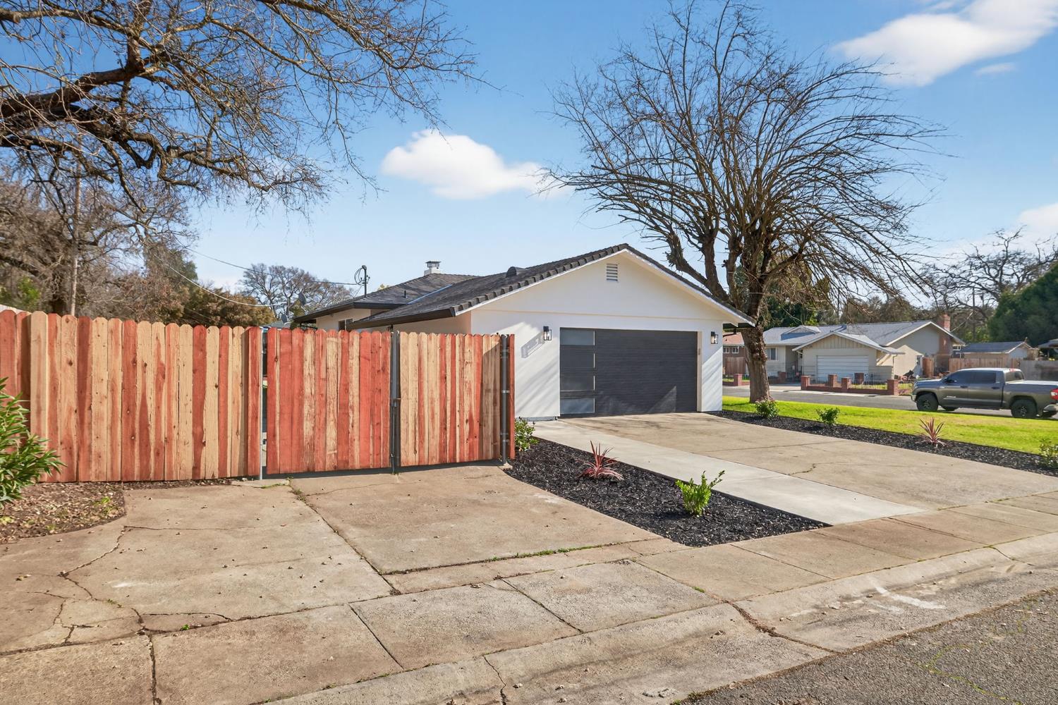 2546 El Vita Way Carmichael, CA 95608 - Photo 2 of 52 a view of a house with swimming pool and a yard
