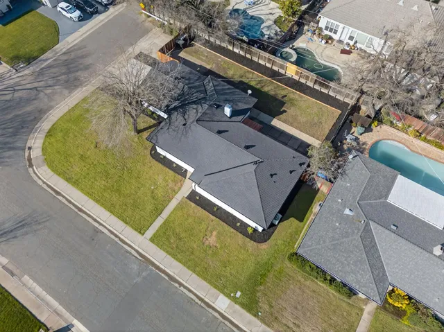 an aerial view of a swimming pool