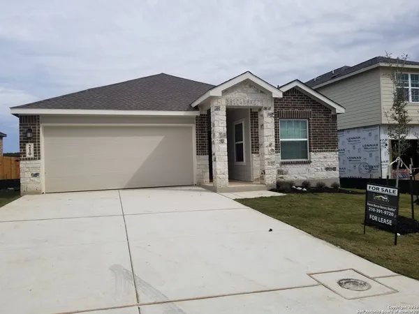 a front view of house with yard