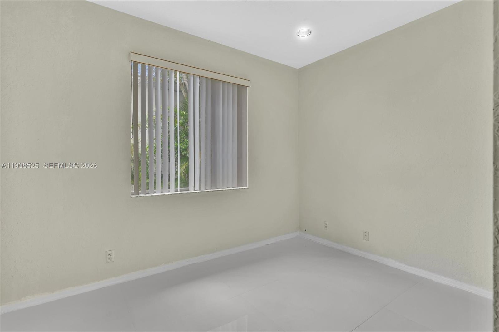 18579 Harbor Light Way Boca Raton, FL 33498 - Photo 13 of 30 a view of an empty room with a window