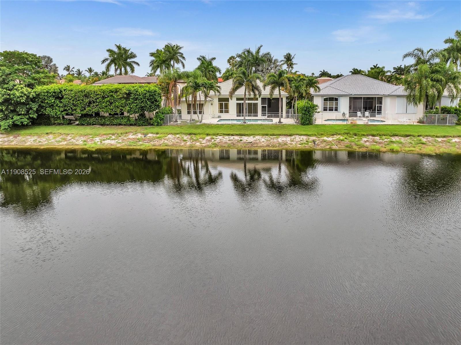 18579 Harbor Light Way Boca Raton, FL 33498 - Photo 21 of 30 a view of residential houses with outdoor space and lake view