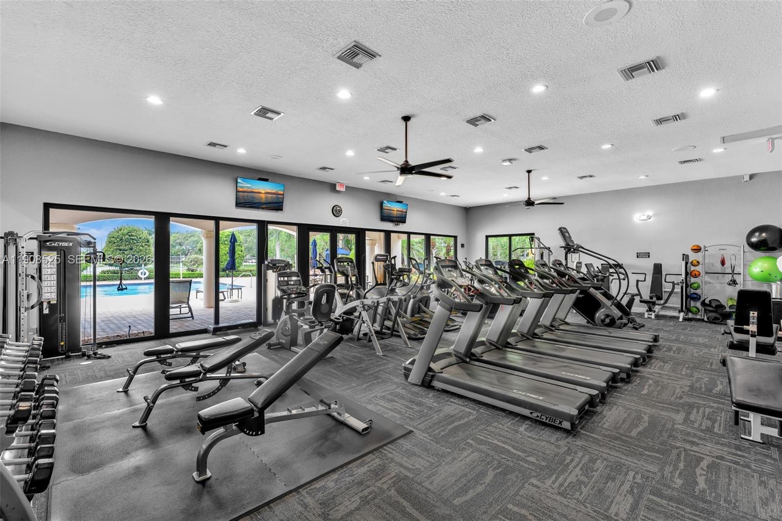 18579 Harbor Light Way Boca Raton, FL 33498 - Photo 23 of 30 a view of a room with gym equipment