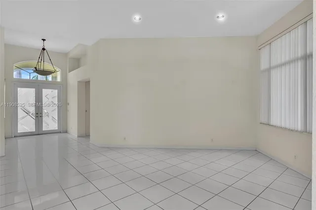 an empty room with windows