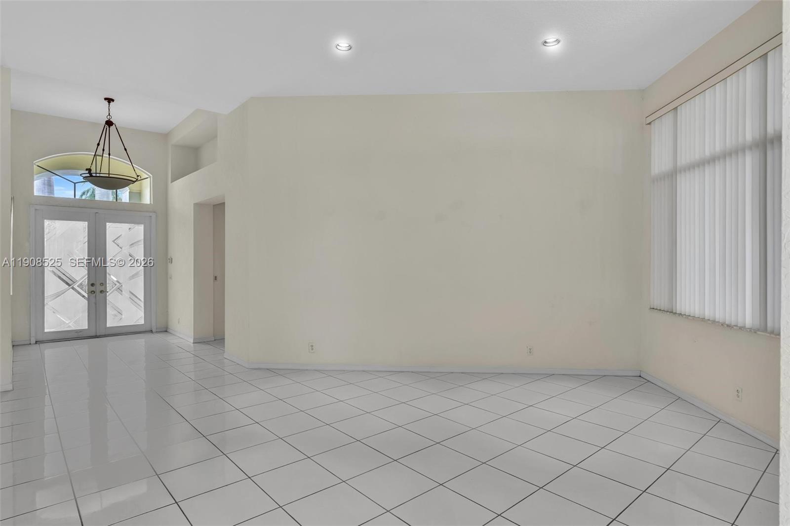 18579 Harbor Light Way Boca Raton, FL 33498 - Photo 8 of 30 an empty room with windows