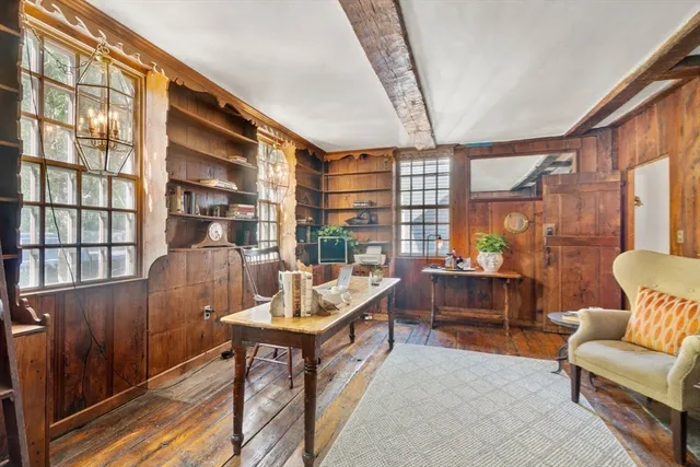 a view of kitchen with furniture and fireplace