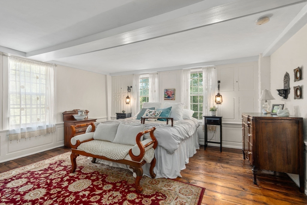 100 Eliot Street Natick, MA 01760 - Photo 25 of 41 a living room with furniture and wooden floor
