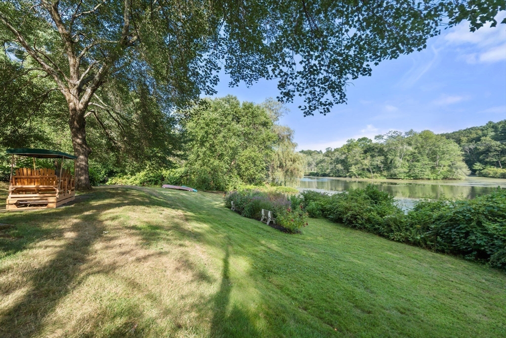 100 Eliot Street Natick, MA 01760 - Photo 35 of 41 a view of a lake with a yard