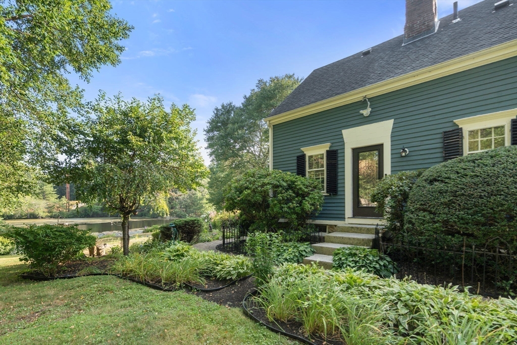 100 Eliot Street Natick, MA 01760 - Photo 39 of 41 a front view of a house with a yard