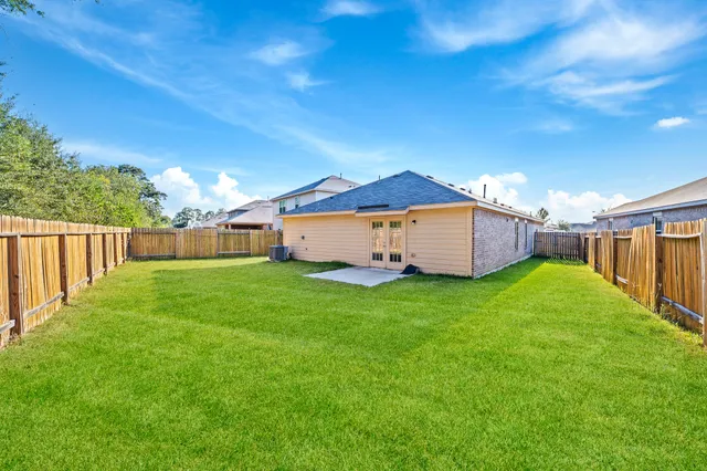 a view of a backyard with a garden