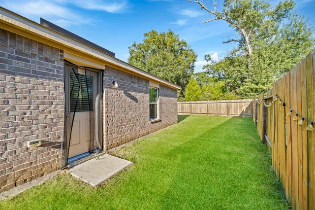a view of a backyard with a garden