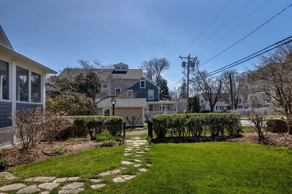 329 Front Street Marion, MA 02738 - Photo 9 of 42 a view of a house with a garden