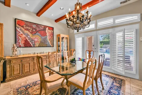 a view of balcony with furniture