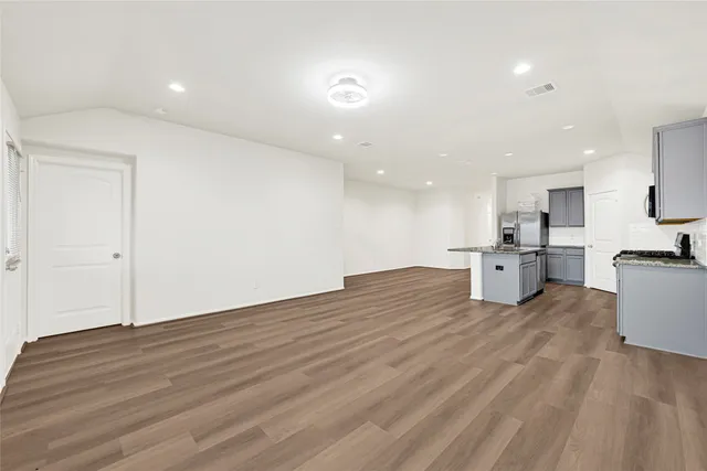 a view of kitchen with wooden floor