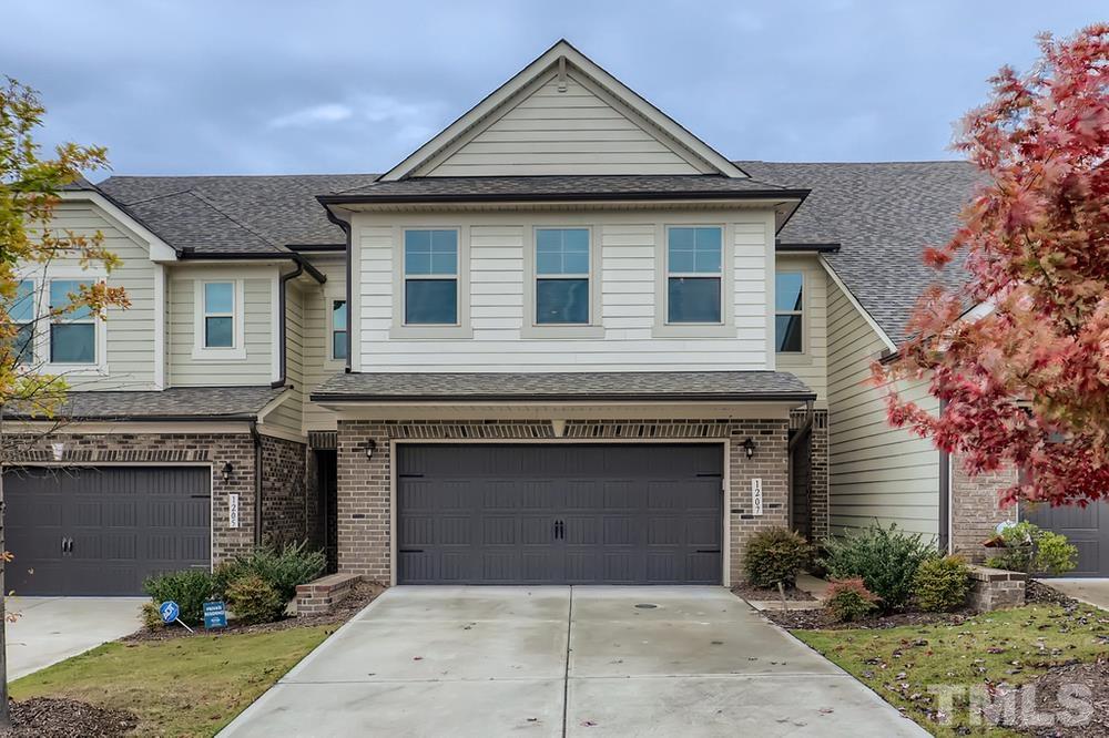 1207 Catch Fly Lane Durham, NC 27713 - Photo 1 of 28 a front view of a house