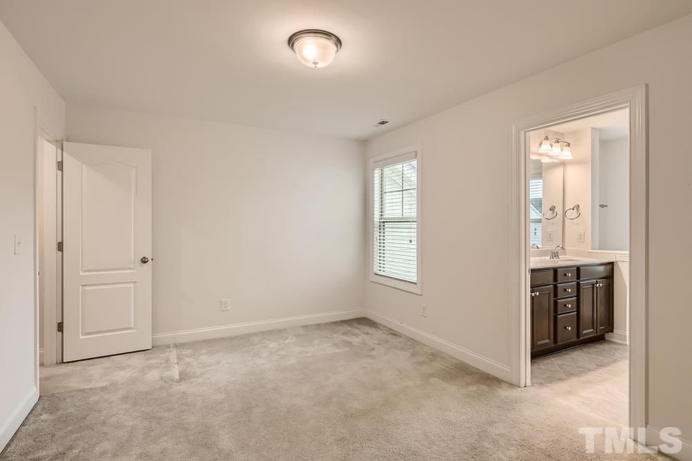 1207 Catch Fly Lane Durham, NC 27713 - Photo 18 of 28 a view of an empty room with a window