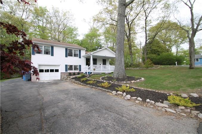 23 Birchwood Road Monroe, CT 06468 - Photo 1 of 1 front view of a house with a yard