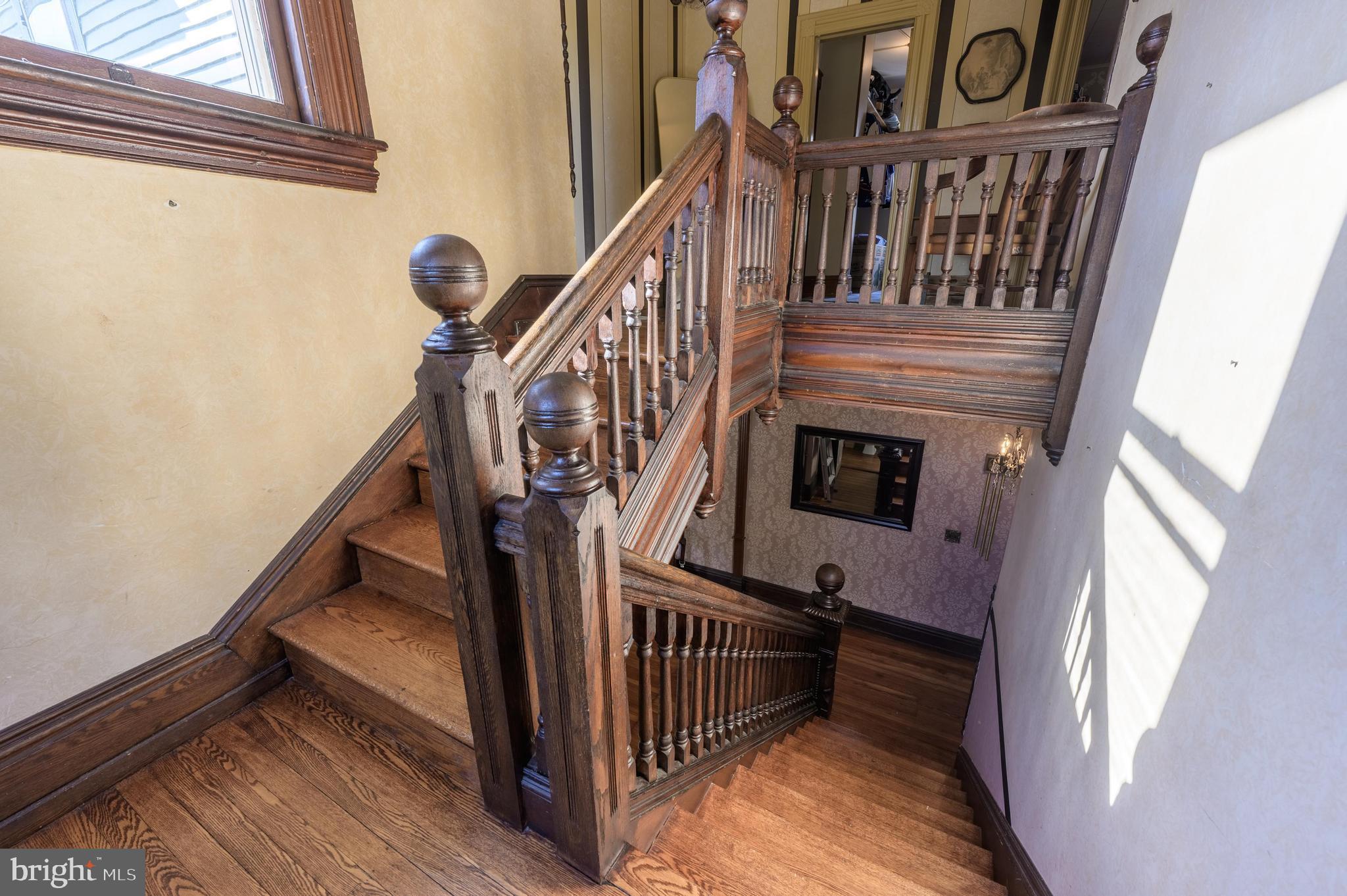 48 Broad Street Mount Holly, NJ 08060 - Photo 28 of 63 a view of entryway and hall with wooden floor