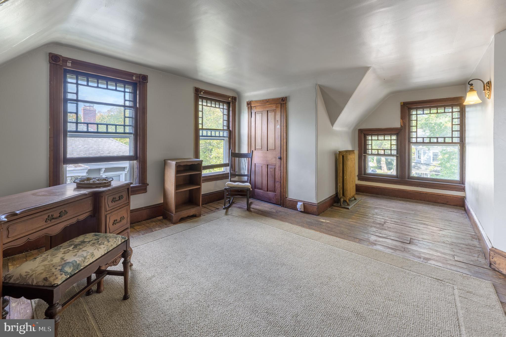 48 Broad Street Mount Holly, NJ 08060 - Photo 45 of 63 a view of a livingroom with furniture and windows