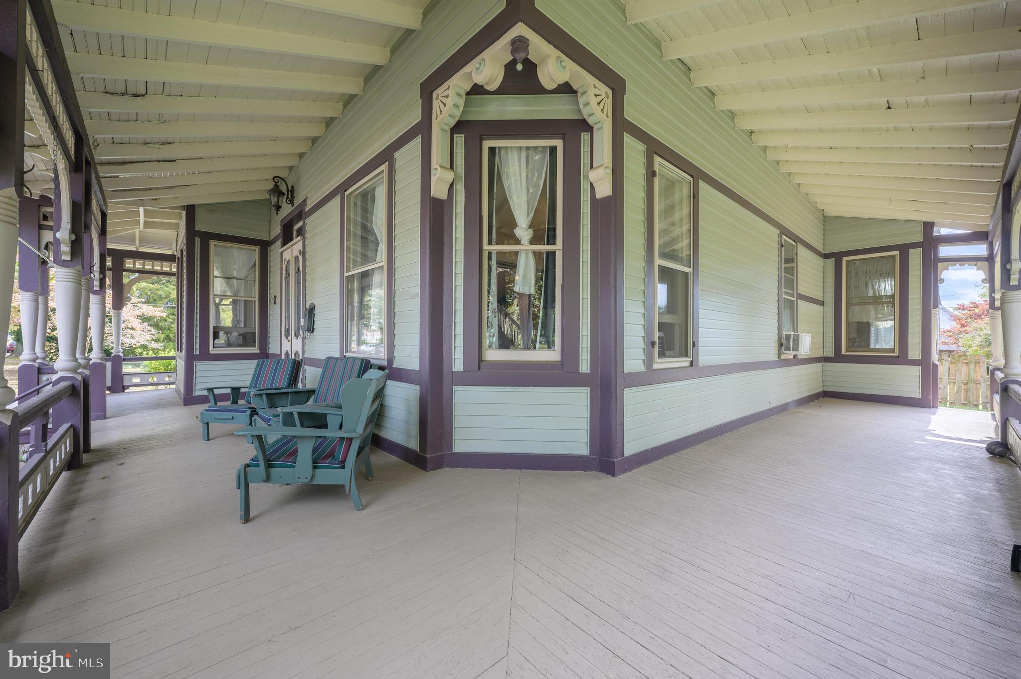 48 Broad Street Mount Holly, NJ 08060 - Photo 6 of 63 a view of an entryway with wooden floor and windows